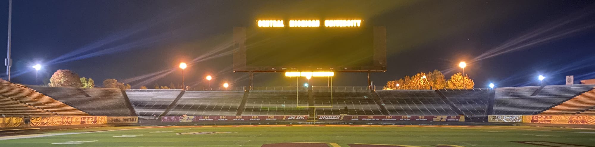 empty football stadium at night under the lights Tucson