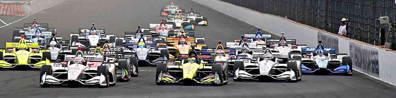 indy cars racing to through the start line Tucson