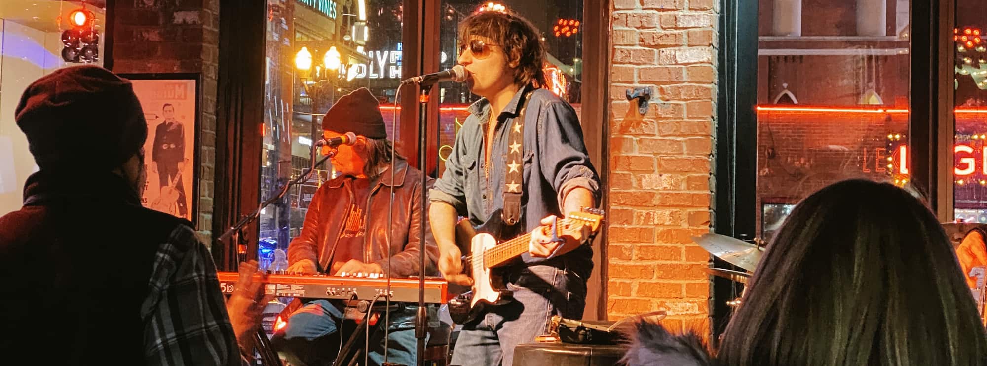 bar singer on guitar in Tucson
